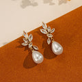 Waterdrop pearl leaf zircon earrings